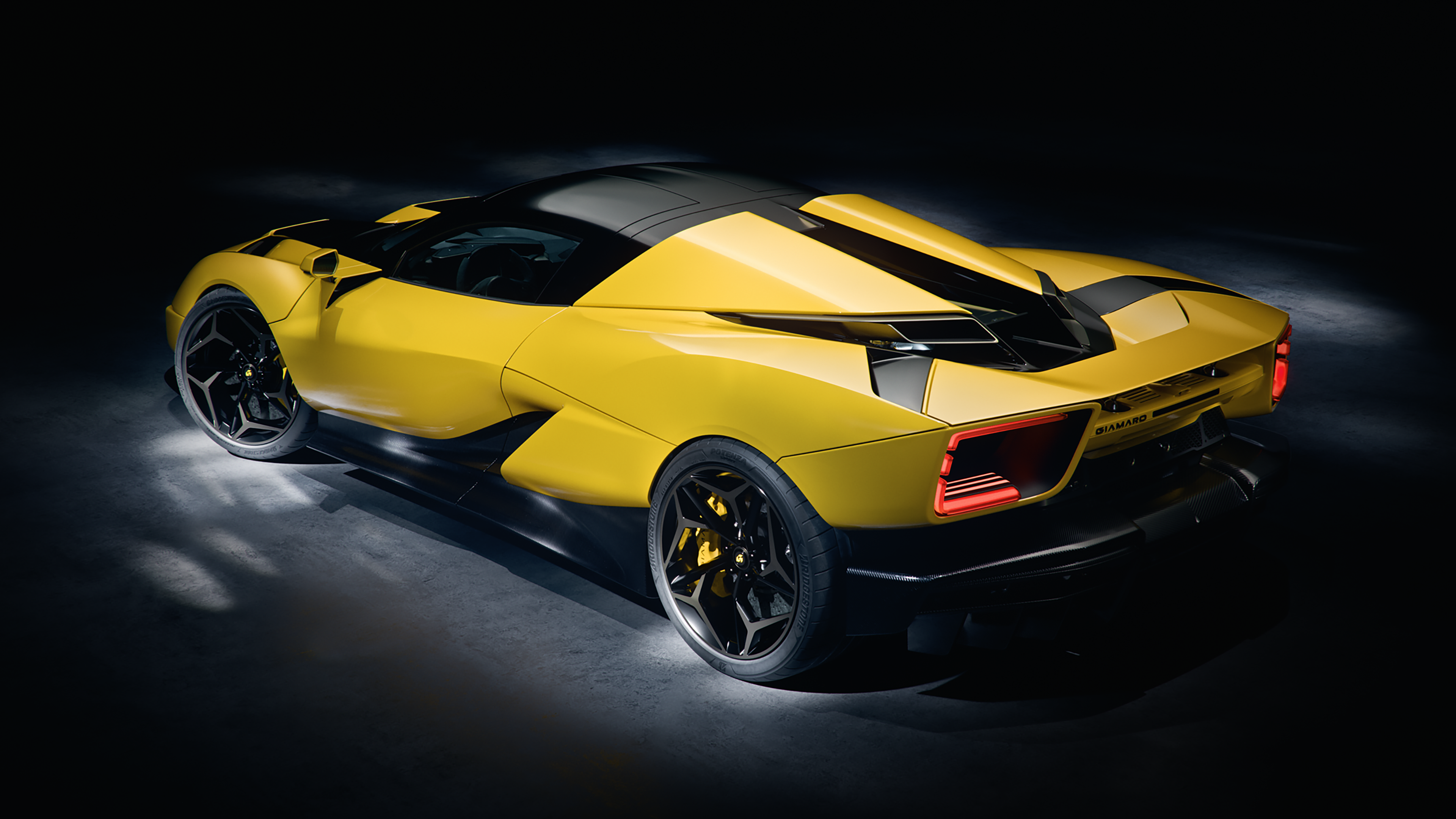 A rear three-quarter view of the yellow Giamaro Katla in a dark studio setting.