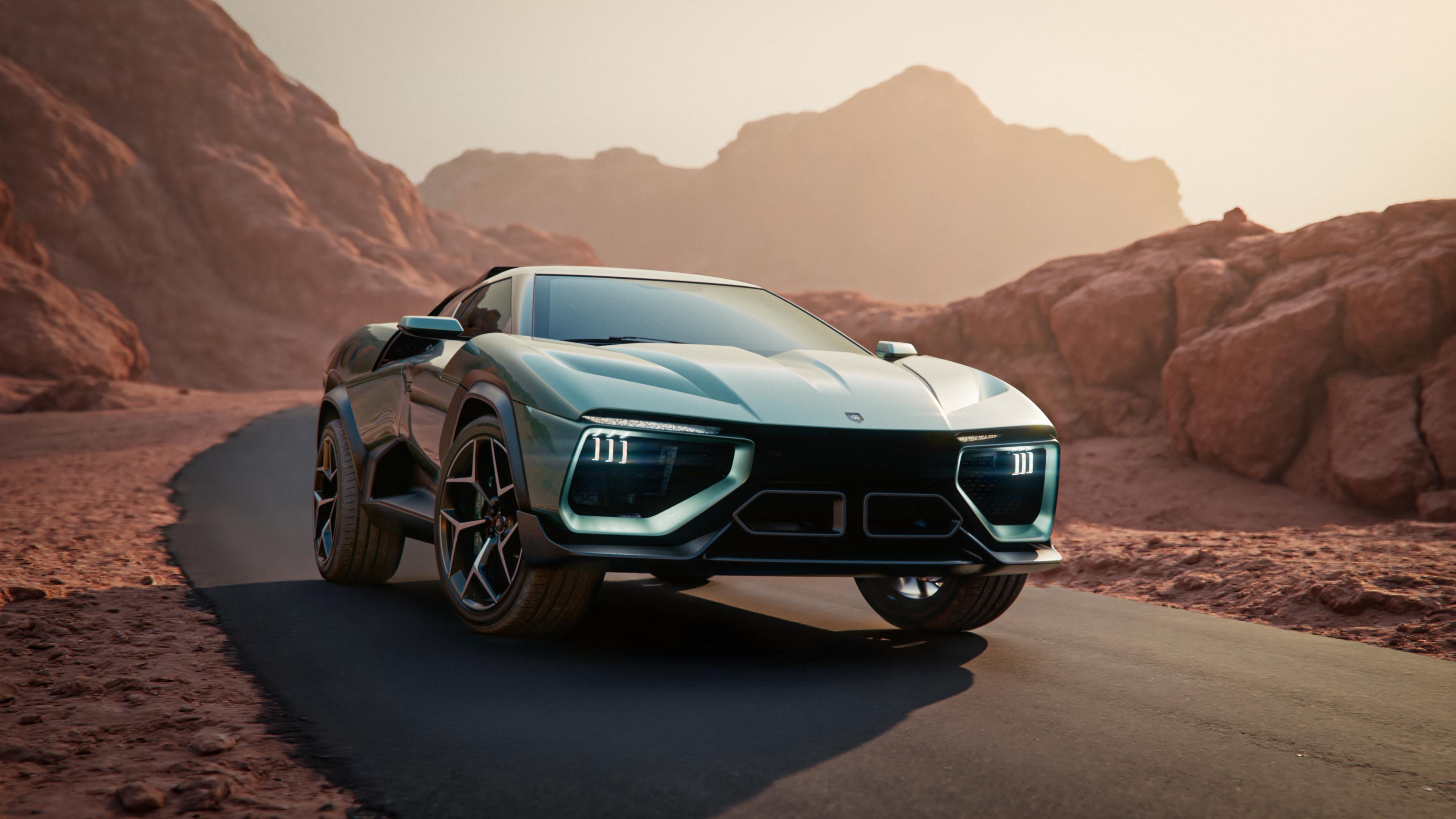 A front three-quarter view of the green Giamaro Albor on a road in a rocky, arid landscape.