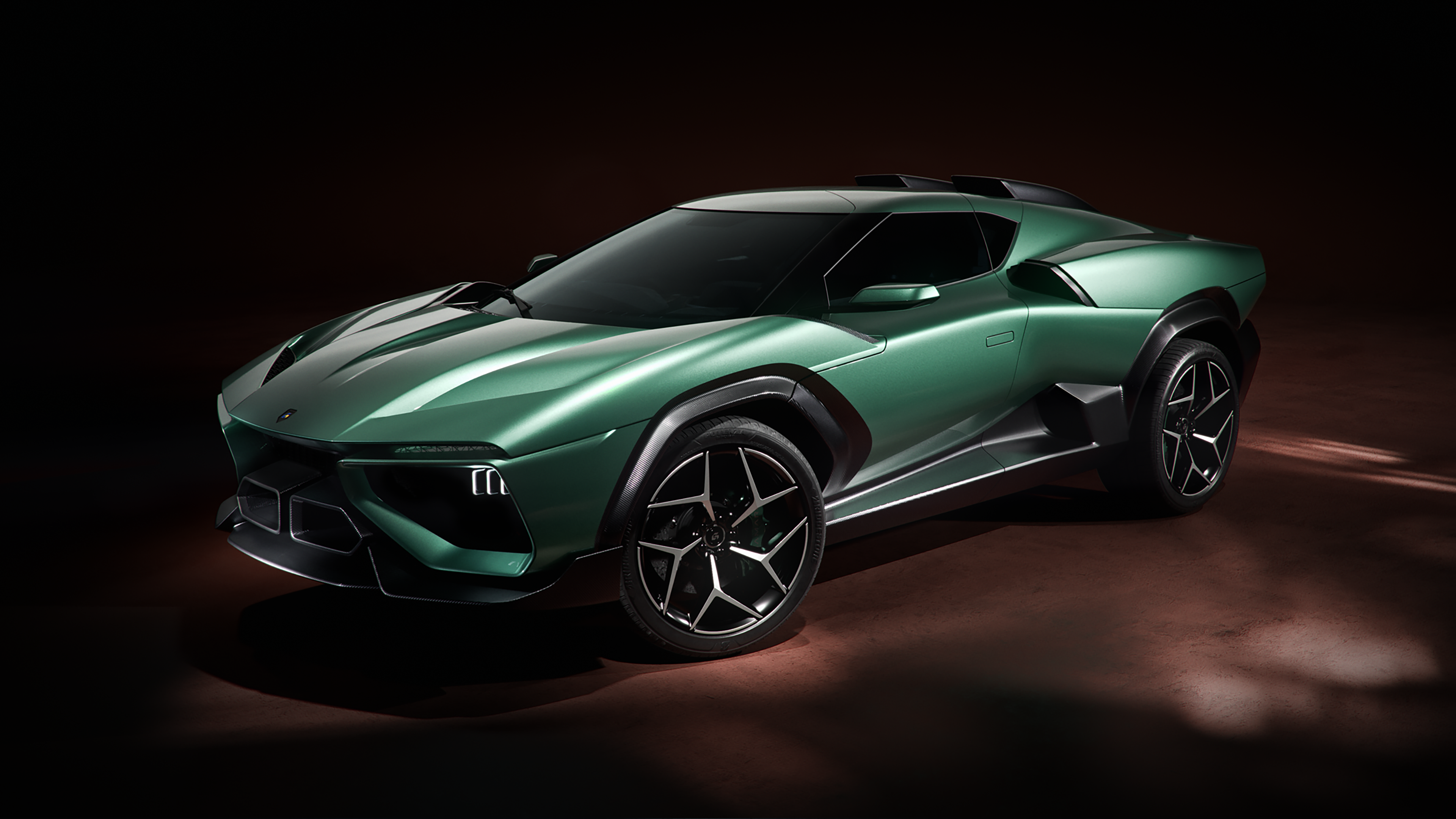 Front three-quarter view of the green Giamaro Albor in a dark studio setting.