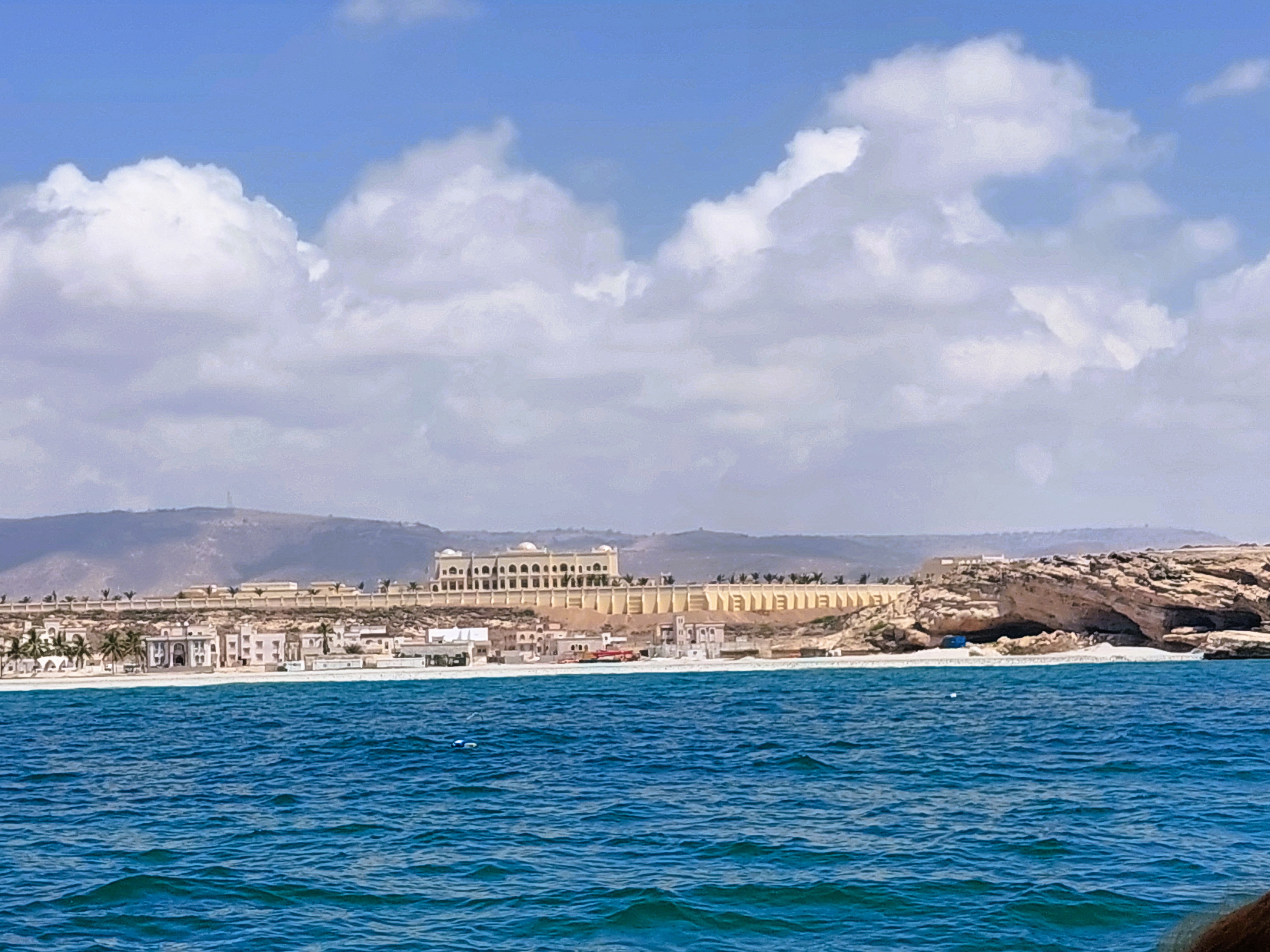 The grand exterior of the Sultan's Palace in Salalah, Oman.